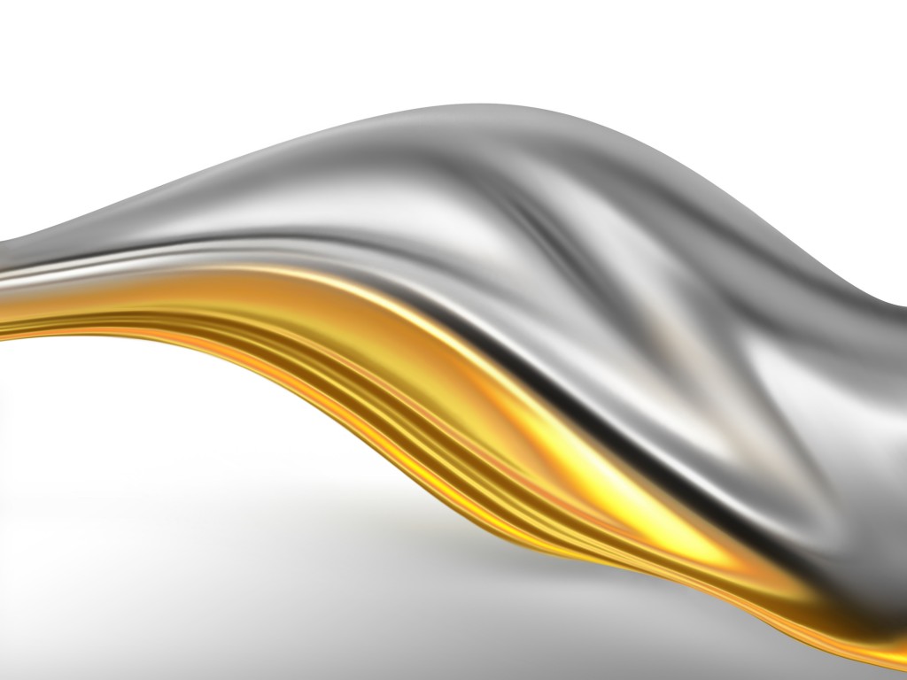 Wave of gold and silver silk on a light background